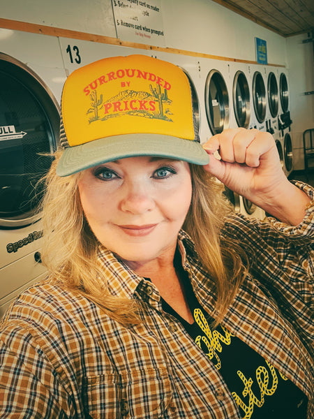 Surrounded by Pricks Trucker Hat