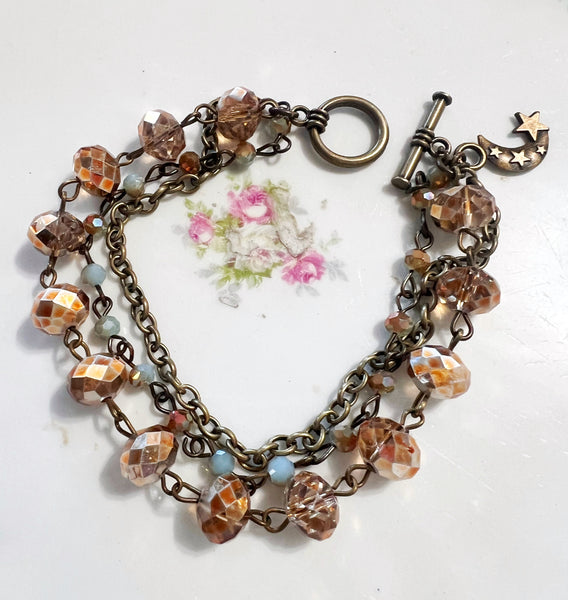 Golden tones Moon Charm Triple Strand Beaded Bracelet