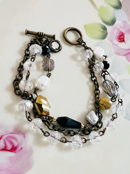 Black Gold Pearl Triple Strand Bracelet