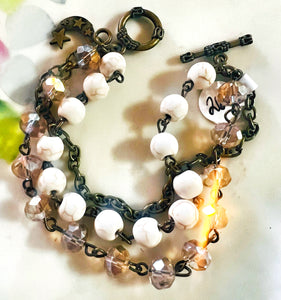 Neutral tones Triple Strand Beaded Bracelet