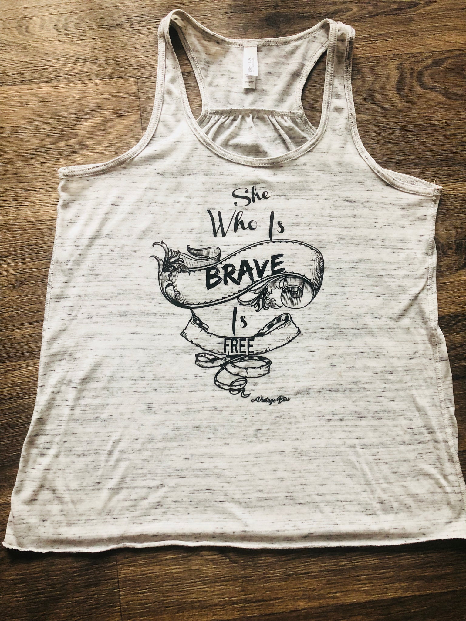 She Who Is Brave is Free Racerback Tank